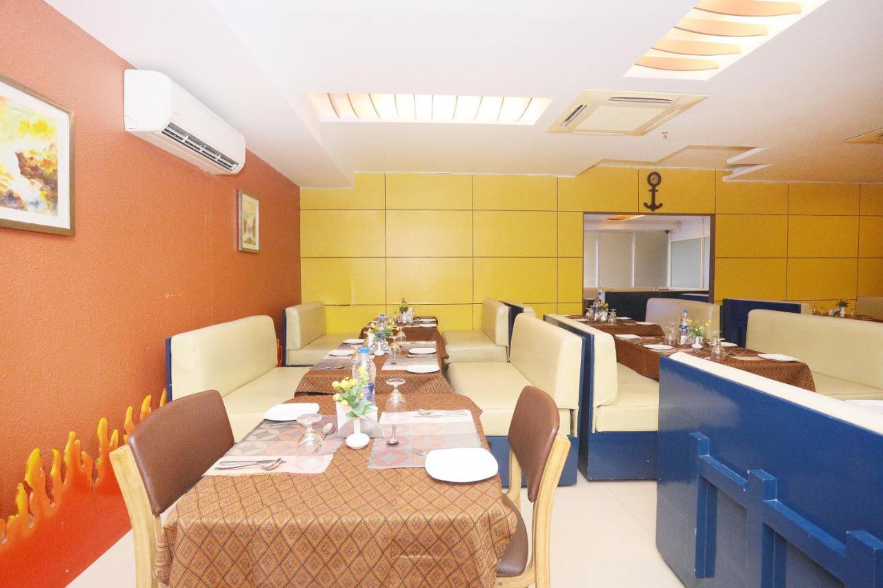 Capital O 45944 Club 7 Hotel Tiruvalla Luaran gambar